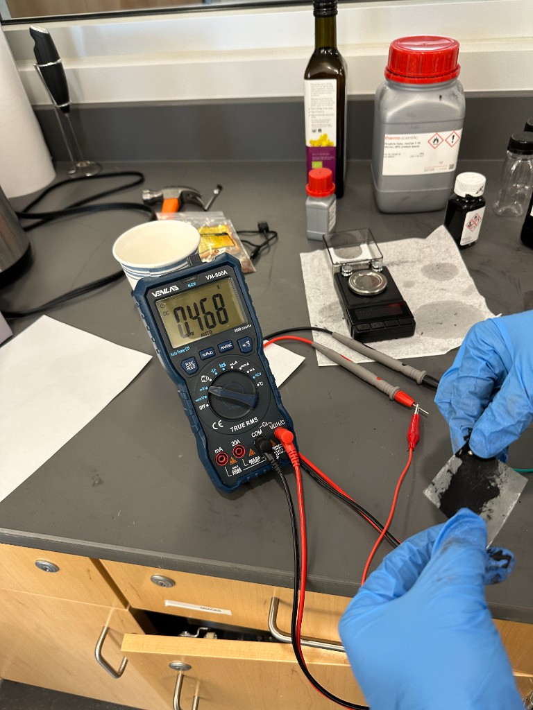 Multimeter reading from hand-fabricated paper battery